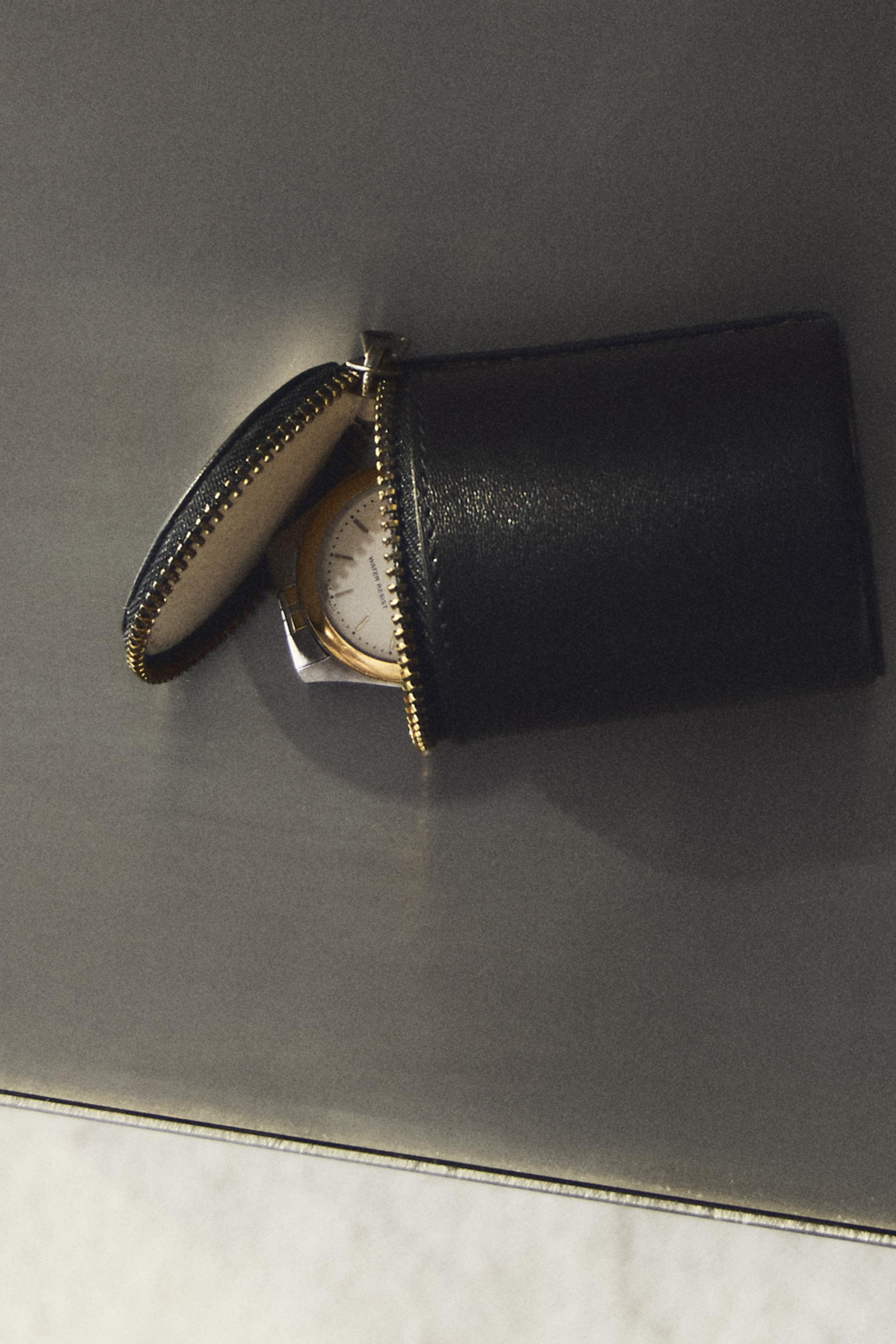TROUSSE EN CUIR CYLINDRIQUE